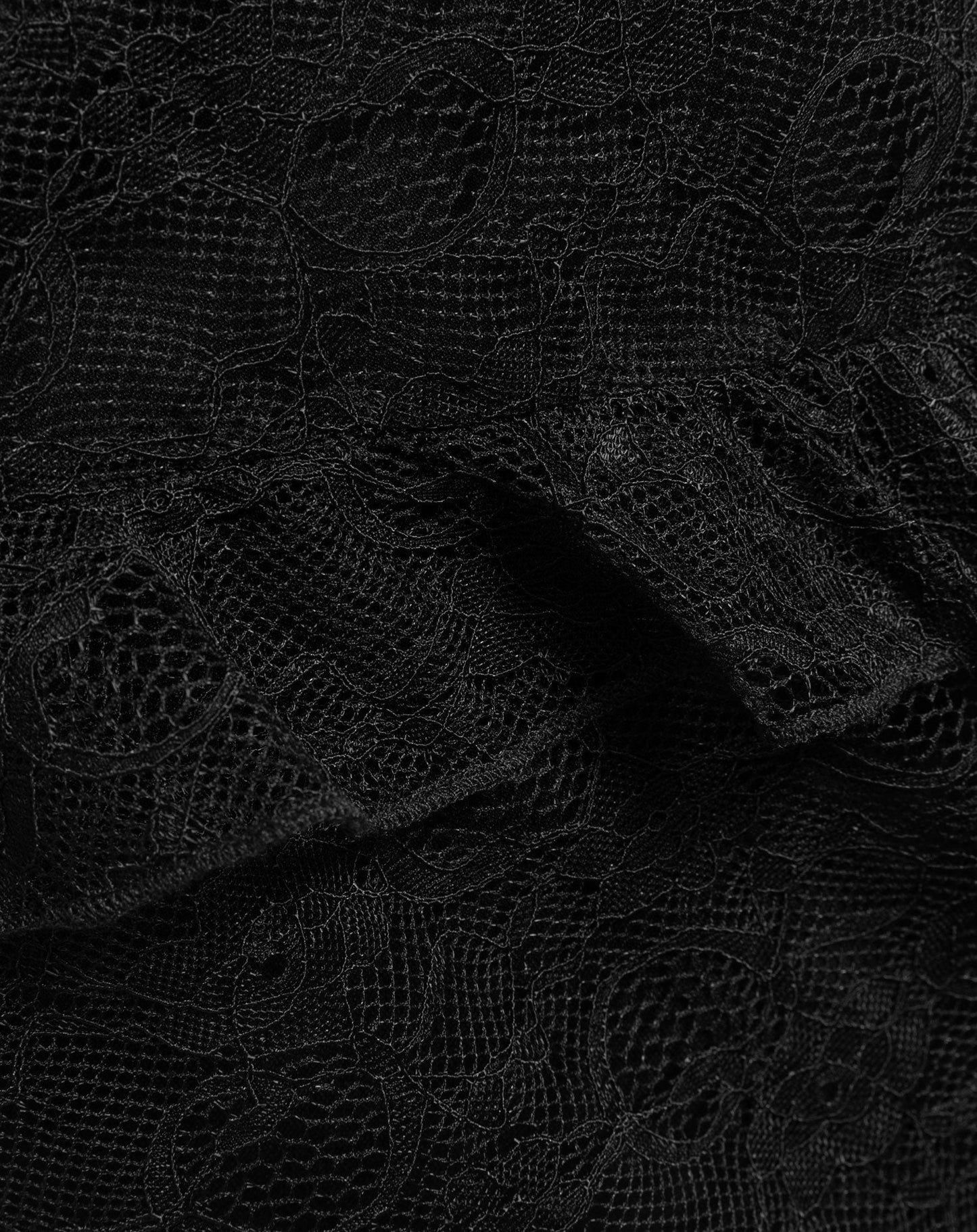 ASYMMETRIC LACE RUFFLE TOP ZWART