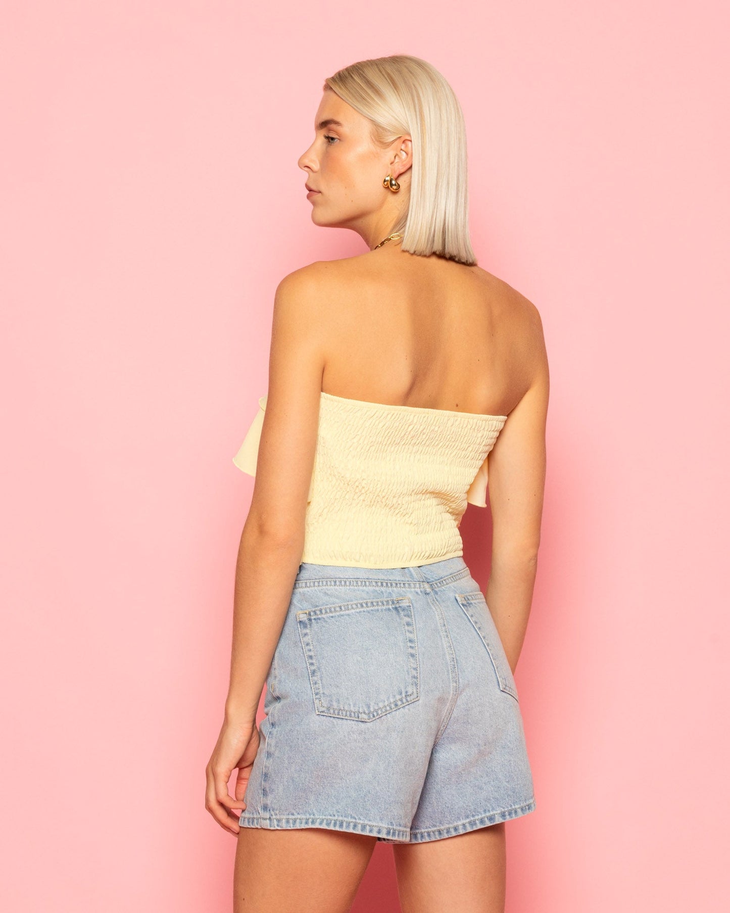 JULIE STRAPLESS RUFFLE TOP BOTERGEEL