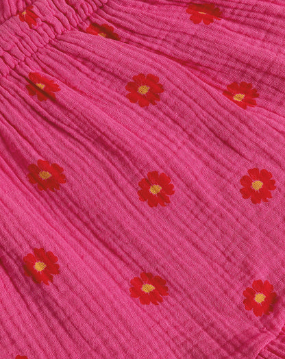 FLOWER MOUSSELINE ONE SLEEVE PLAYSUIT FUCHSIA