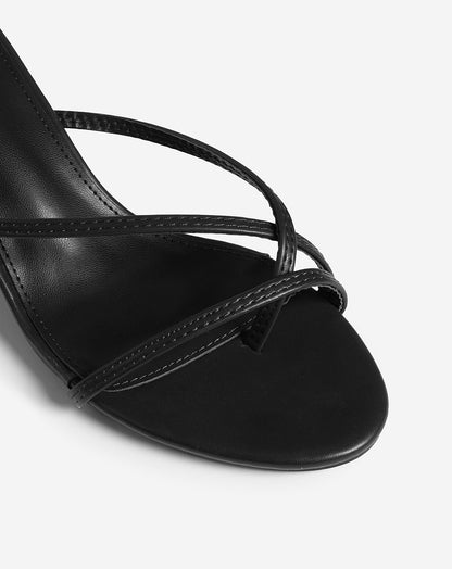 Tacones estilo chancla con tiras
