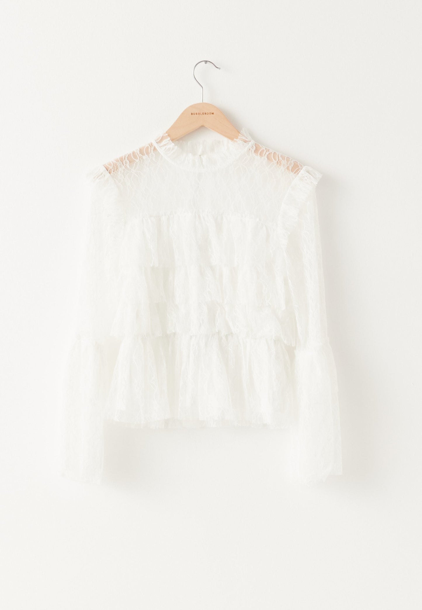 Blusa de encaje con volantes