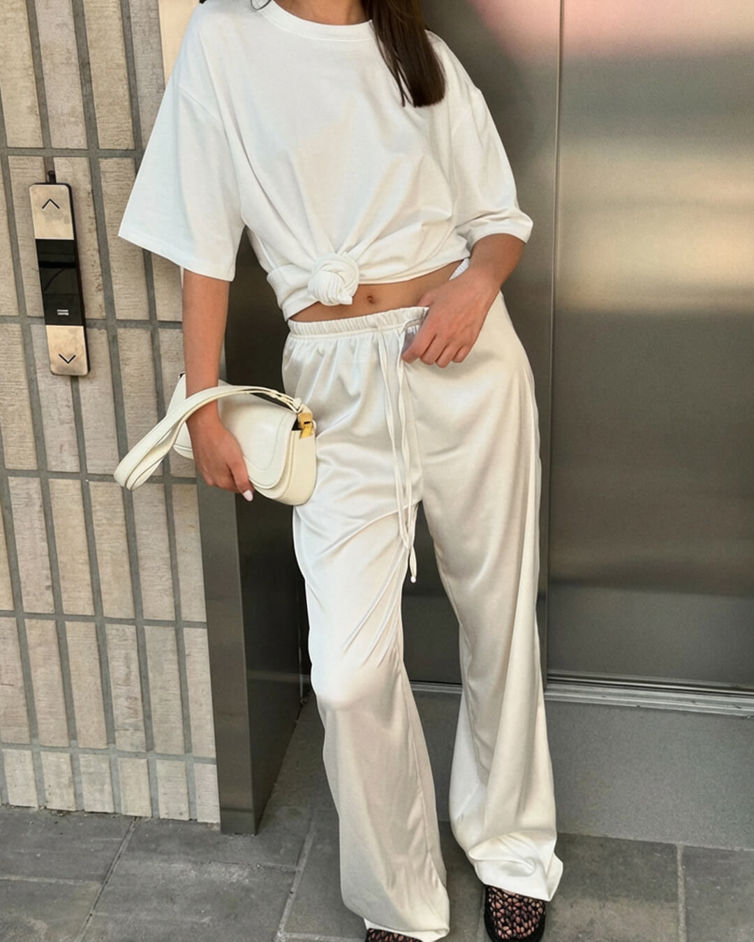 Pantalones anchos de satén de talle alto Norma