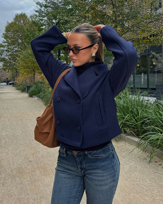 Abrigo cruzado de doble botonadura