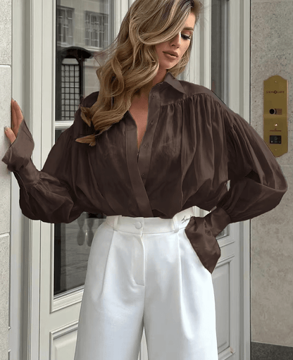 Blusa translúcida abotonada Brielle